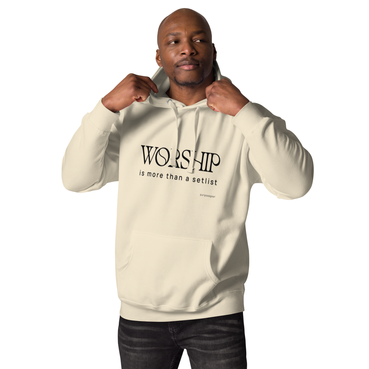 Man wearing the Bone Worship Is More Than a Setlist hoodie, pulling up the hood